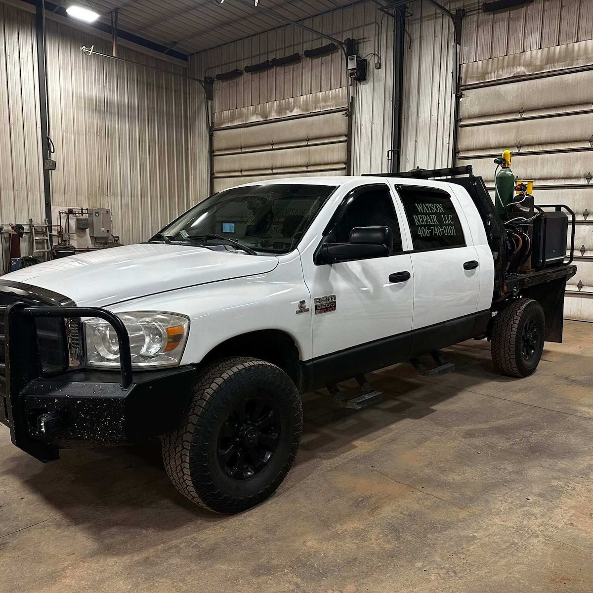 Pickup truck in the service bay, ready for a mobile call